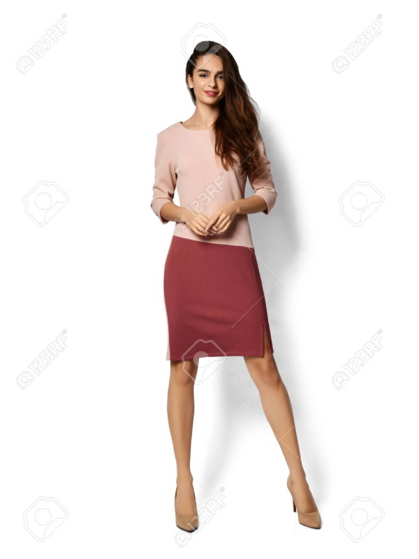 low_137654315-young-beautiful-woman-posing-in-new-fashion-plaid-skirt-and-blouse-full-body-happy-smiling-on-a.jpg